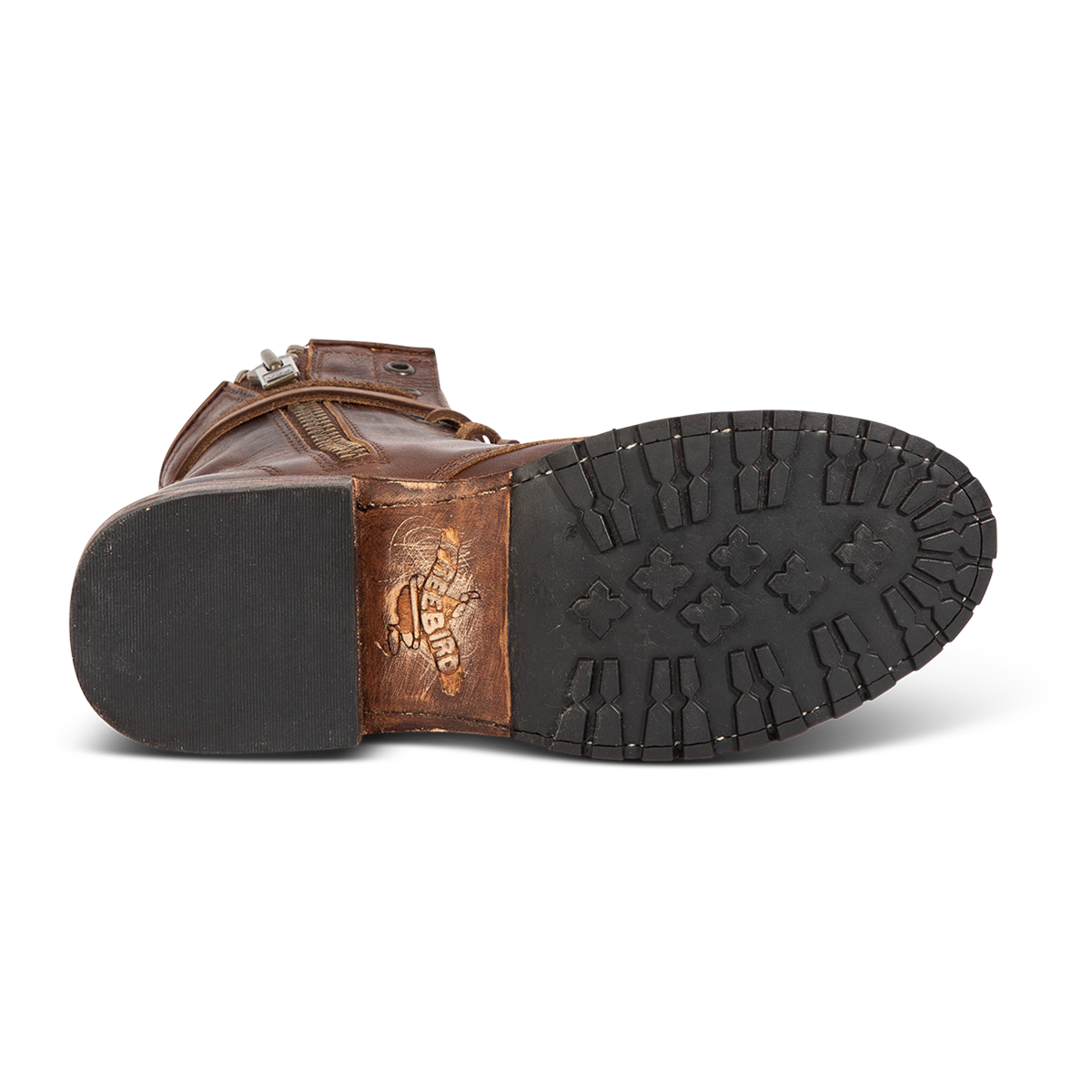 Tread sole imprinted with FREEBIRD on women's Manchester cold brew leather combat bootie