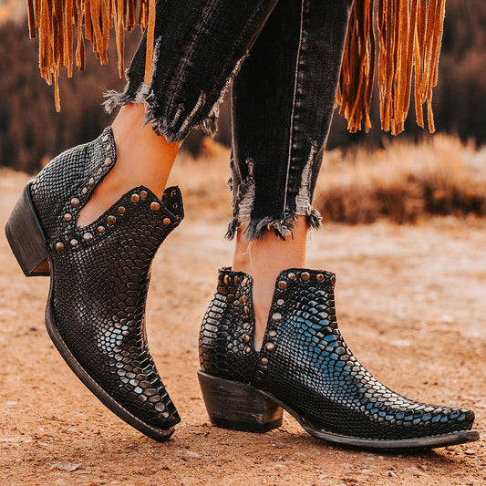 FREEBIRD women's Mandy black embossed leather ankle bootie with exposed ankle cutouts, studded detailing and snip toe construction 