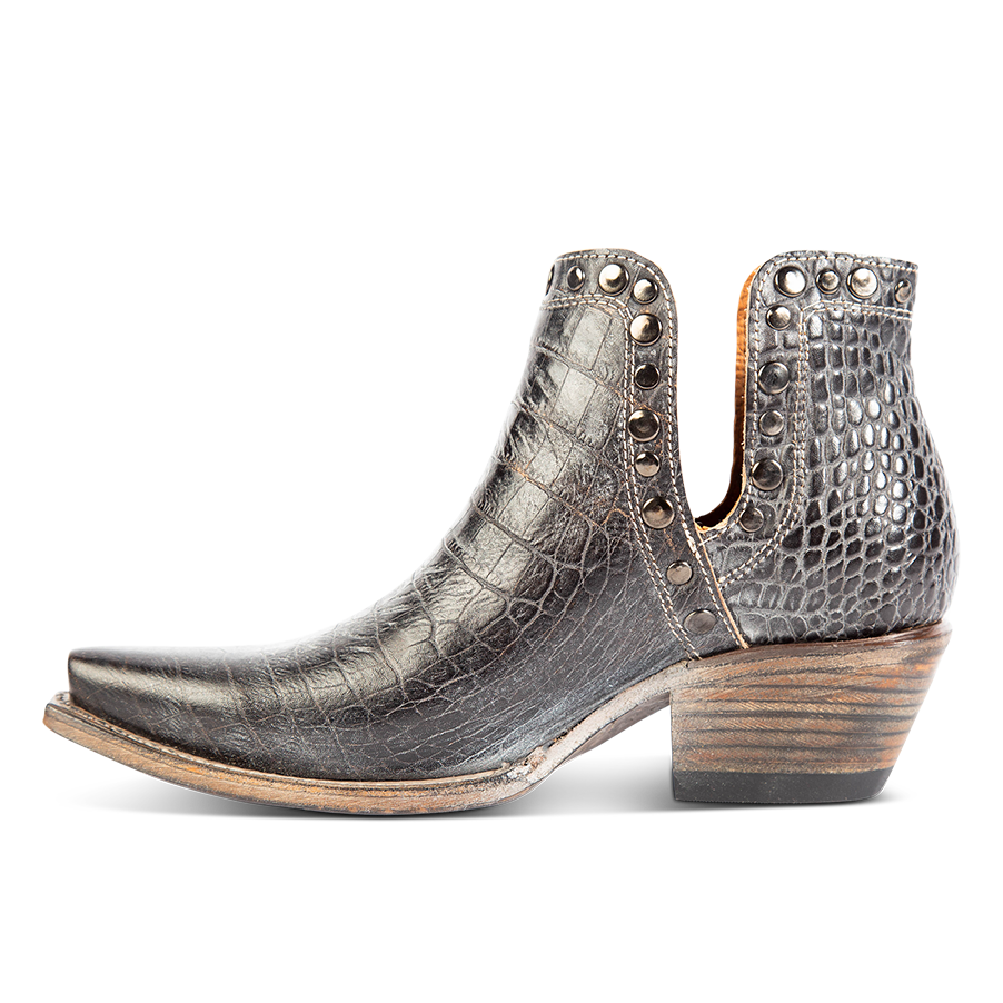 Inside view showing exposed ankle cutouts, studded detailing and snip toe construction on FREEBIRD women's Mandy ice snake embossed leather ankle bootie
