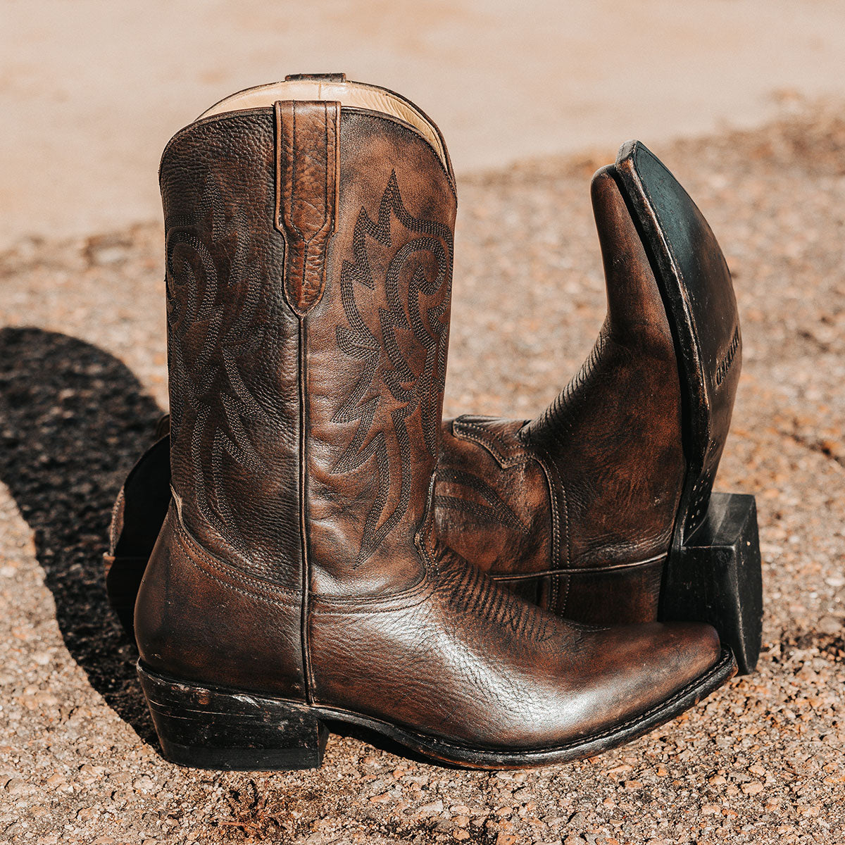 FREEBIRD men's Marshall black distressed leather western cowboy boot with shaft stitch detailing, snip toe construction and leather pull straps