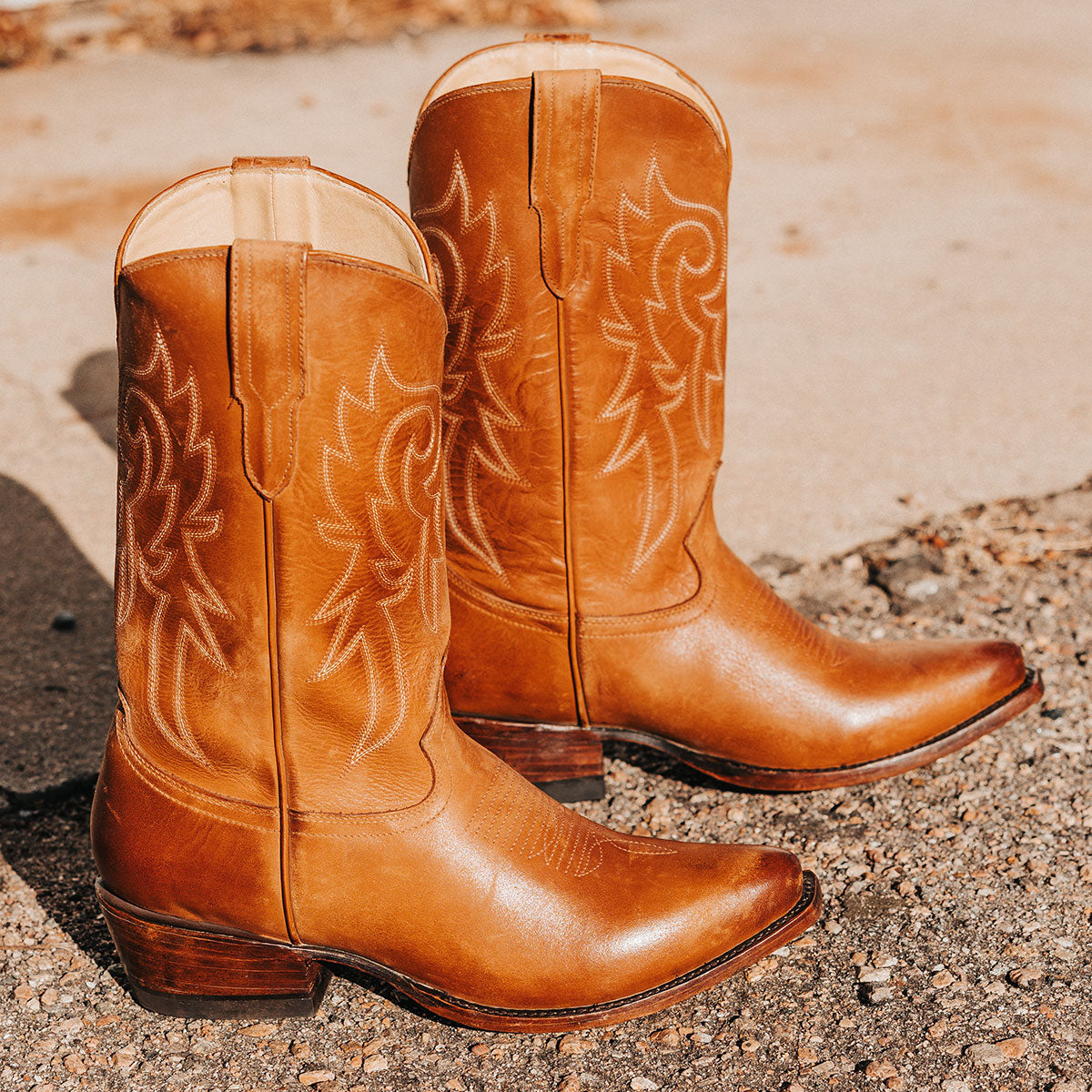 FREEBIRD men's Marshall whiskey leather western cowboy boot with shaft stitch detailing, snip toe construction and leather pull straps