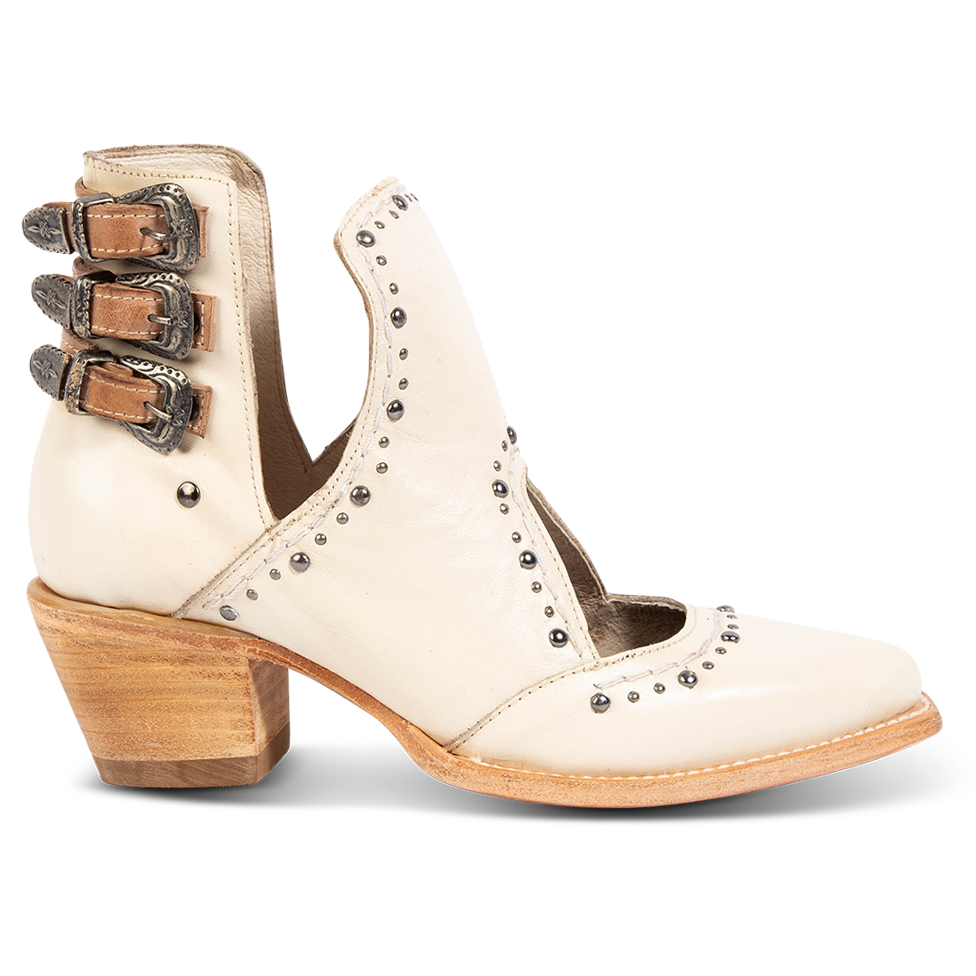 FREEBIRD women's Melody beige leather shoe with v-cut sides, stud detailing, and low heel