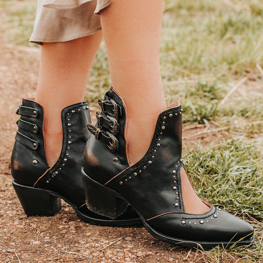 FREEBIRD women's Melody black leather shoe with v-cut sides, stud detailing, and low heel