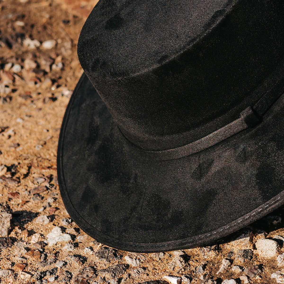 FREEBIRD Moonshine black flat wide-brim hat featuring boater-shaped crown and tonal band