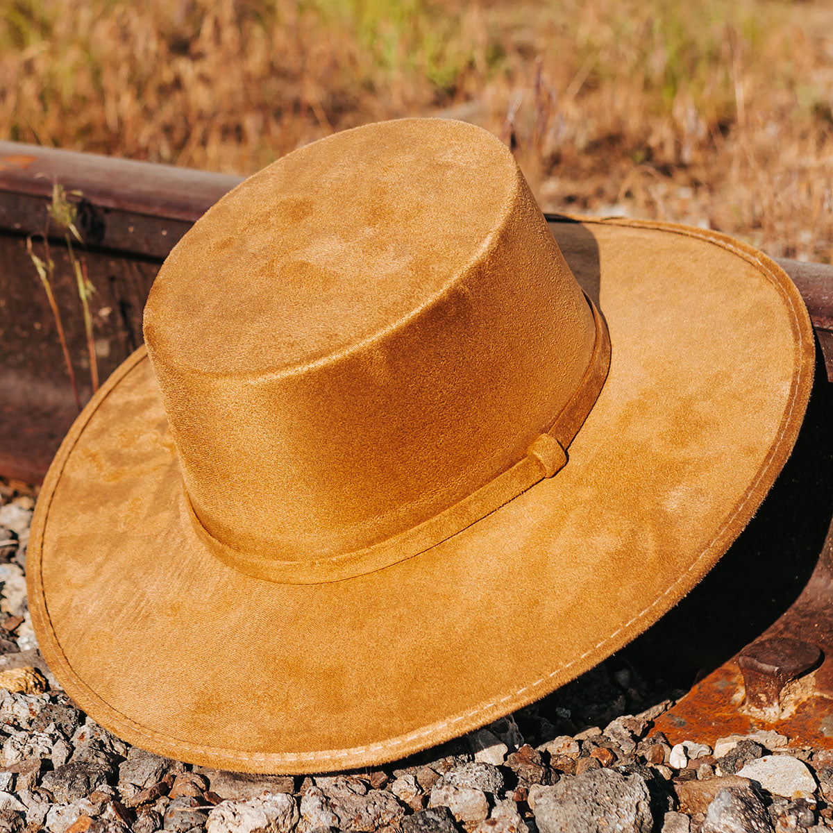 FREEBIRD Moonshine camel flat wide-brim hat featuring boater-shaped crown and tonal band