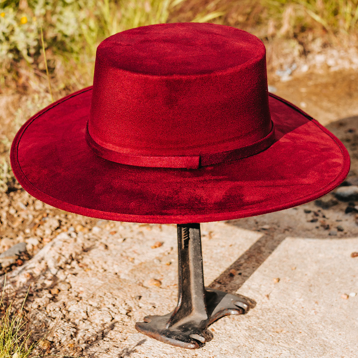 FREEBIRD Moonshine wine flat wide-brim hat featuring boater-shaped crown and tonal band