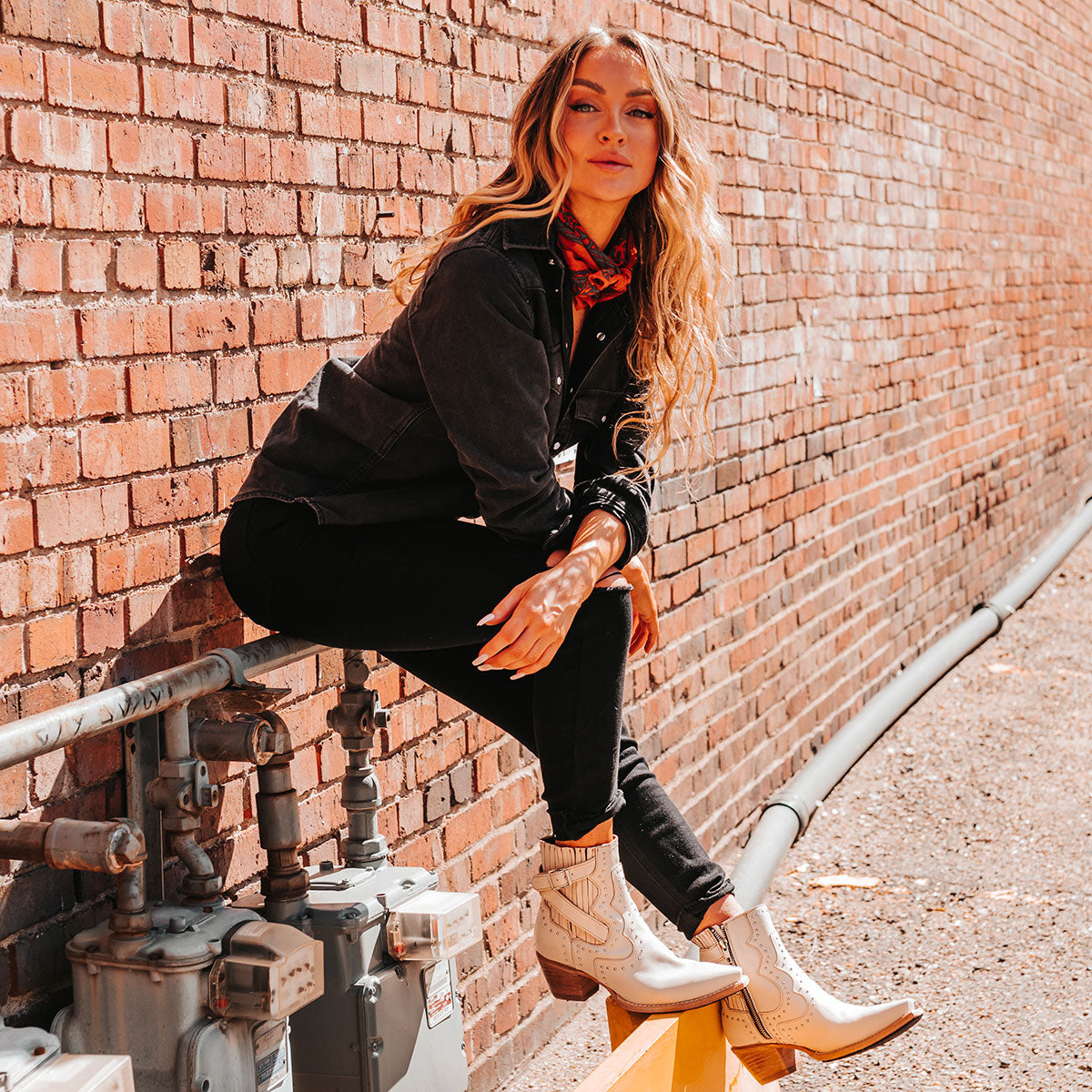 FREEBIRD women's Morgan beige leather ankle bootie with silver stud embellishments, gore detailing, and buckle straps lifestyle