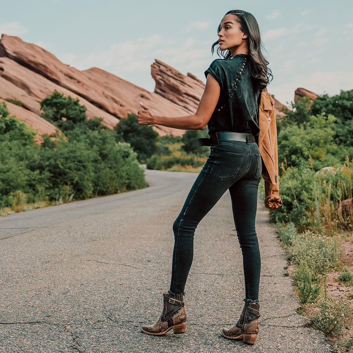 FREEBIRD women's Morgan tan python leather ankle bootie with silver stud embellishments, gore detailing, and buckle straps lifestyle