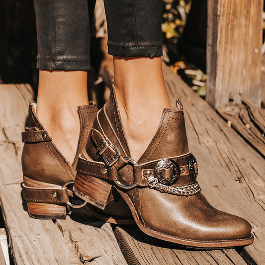 FREEBIRD women's Mystic brown leather belted embellished bootie with ankle framing cuts