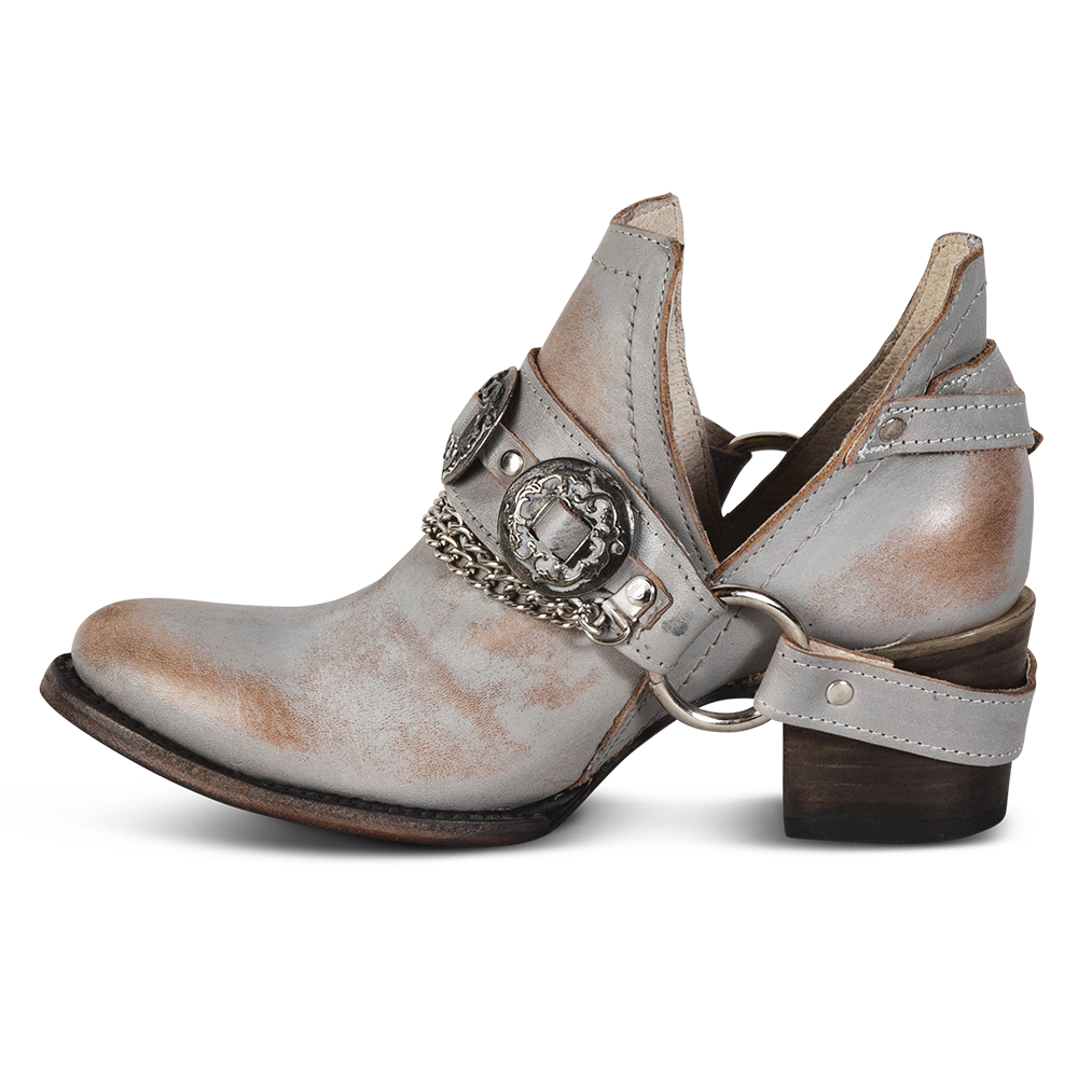 Inside view showing ankle cut-out and embellished leather strap on FREEBIRD women's Mystic smoke bootie