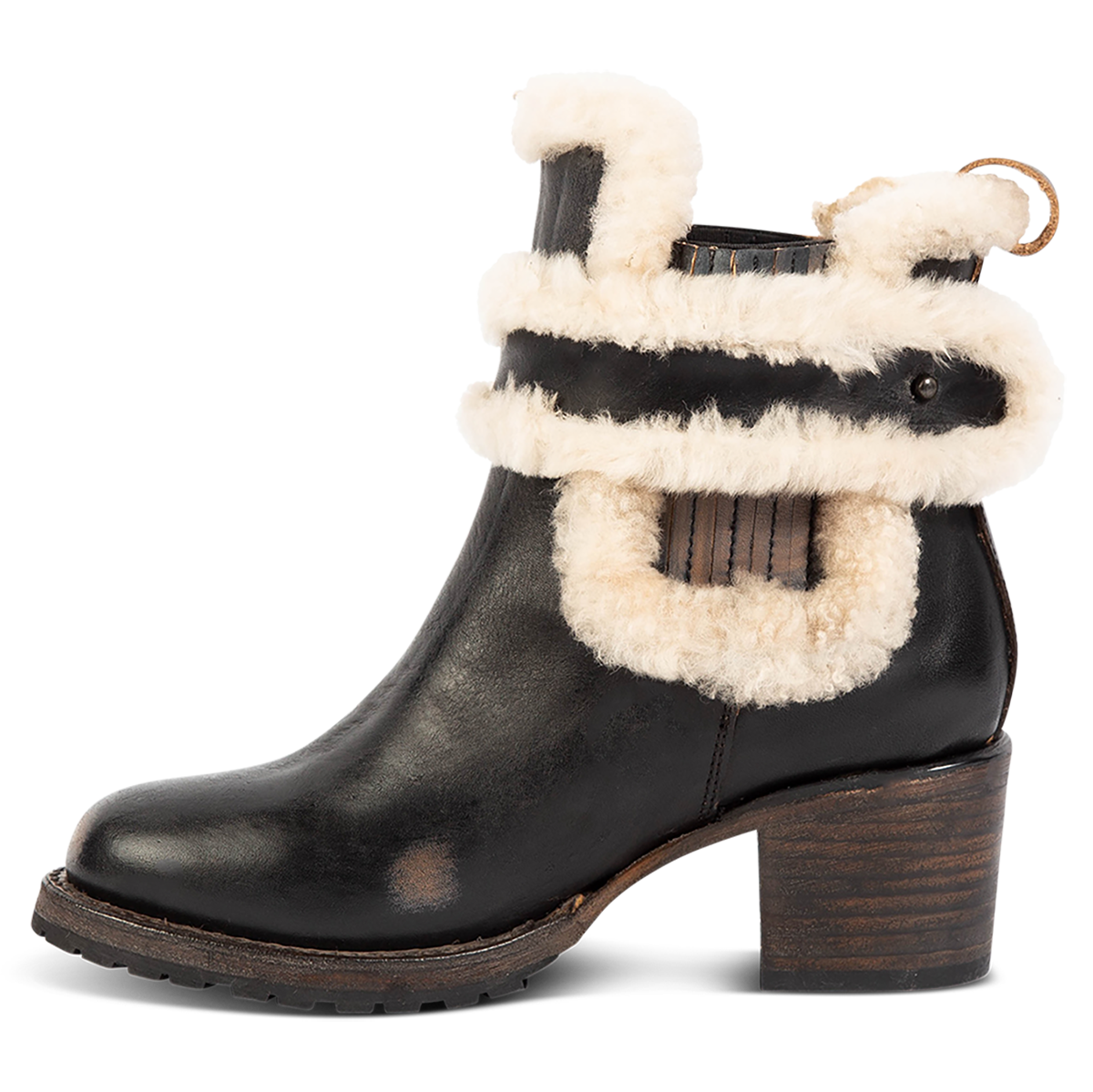 Inside view showing FREEBIRD women's Neverland black leather bootie with genuine shearling removable lining, gore detailing and a stacked heel
