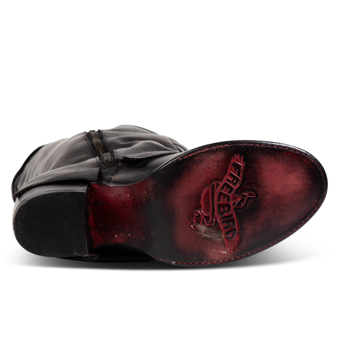 Red leather sole imprinted with FREEBIRD on women's Nighthawk black boot