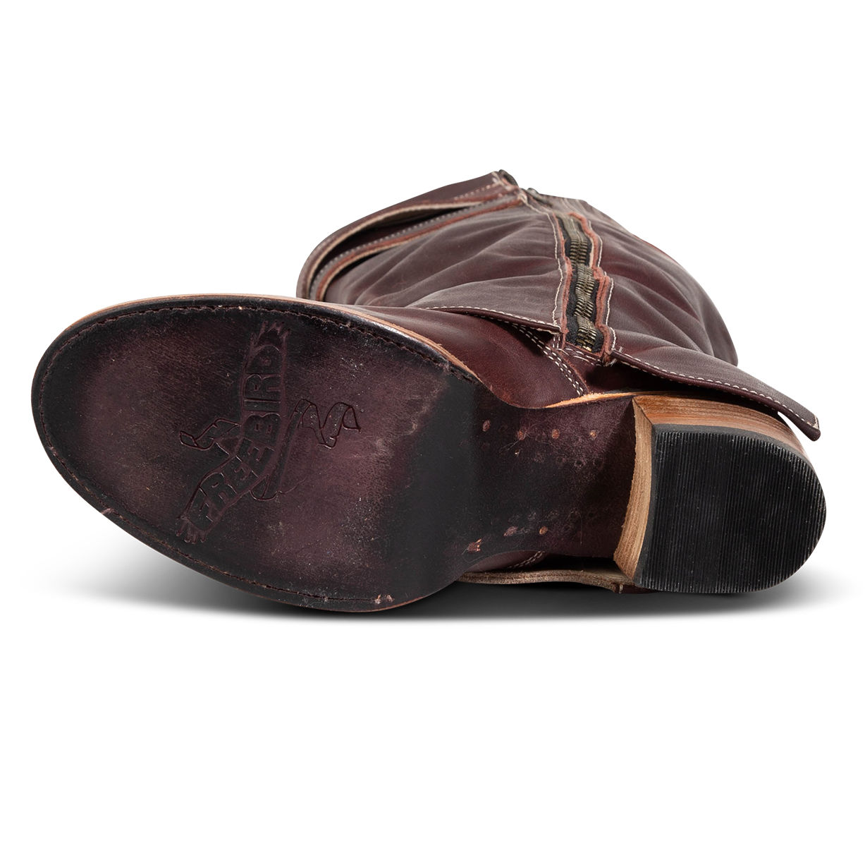 Purple leather sole imprinted with FREEBIRD on women's Nighthawk wine boot