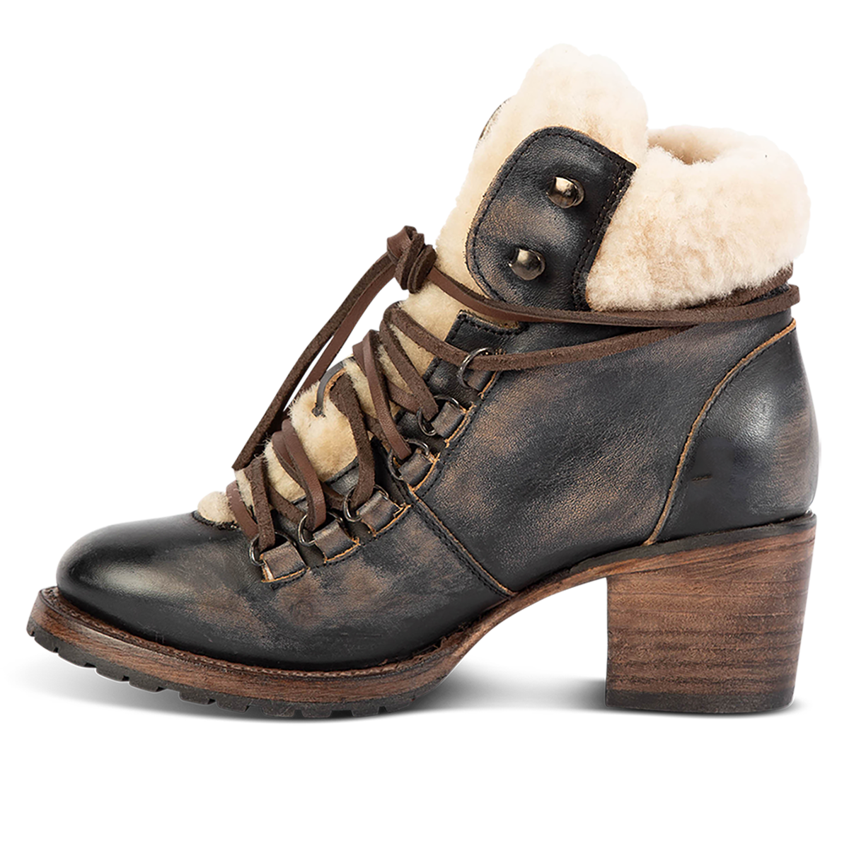 Inside view showing shearling ankle trim and wrap around leather lacing on FREEBIRD women's Norway black leather bootie