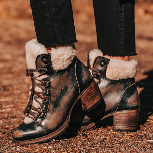 FREEBIRD women's Norway black shearling lined heeled rubber tread sole lace up bootie
