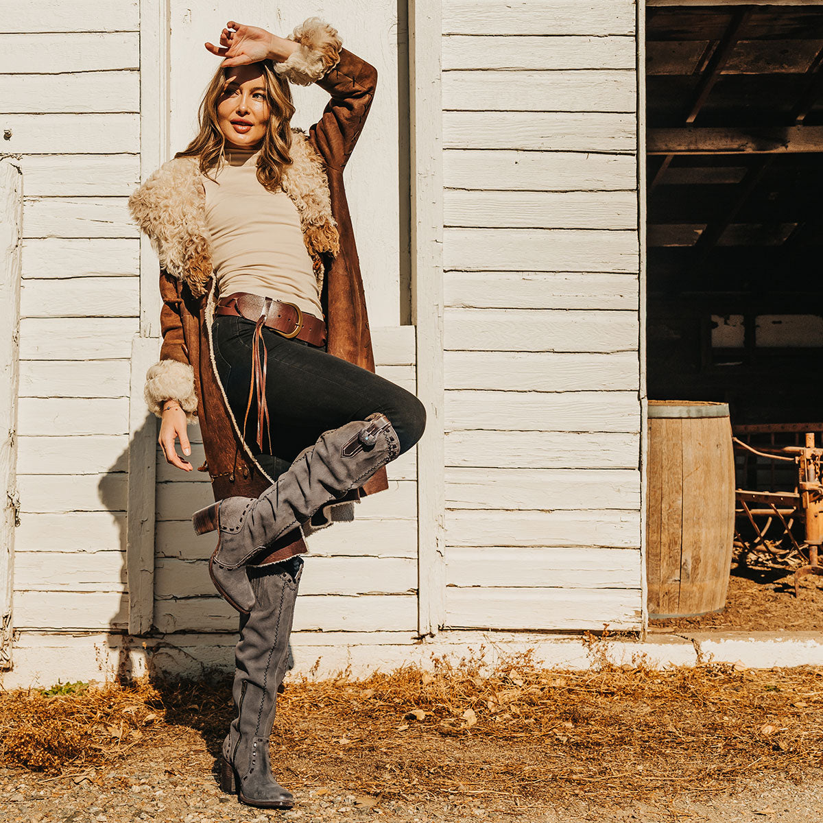 FREEBIRD women's Paisley grey suede knee high boot with whipstitch detailing and brass zip closure lifestyle image