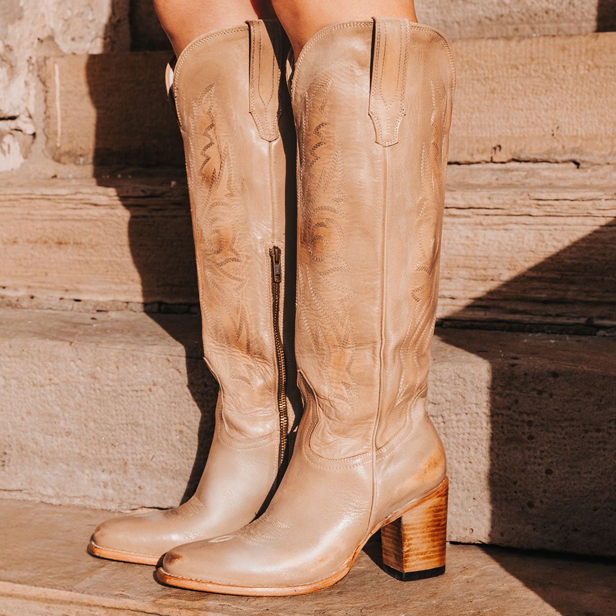 FREEBIRD women's Panama taupe leather elevated cowboy boot with shaft stitch detailing, inside working brass zipper, stacked heel and a snip toe