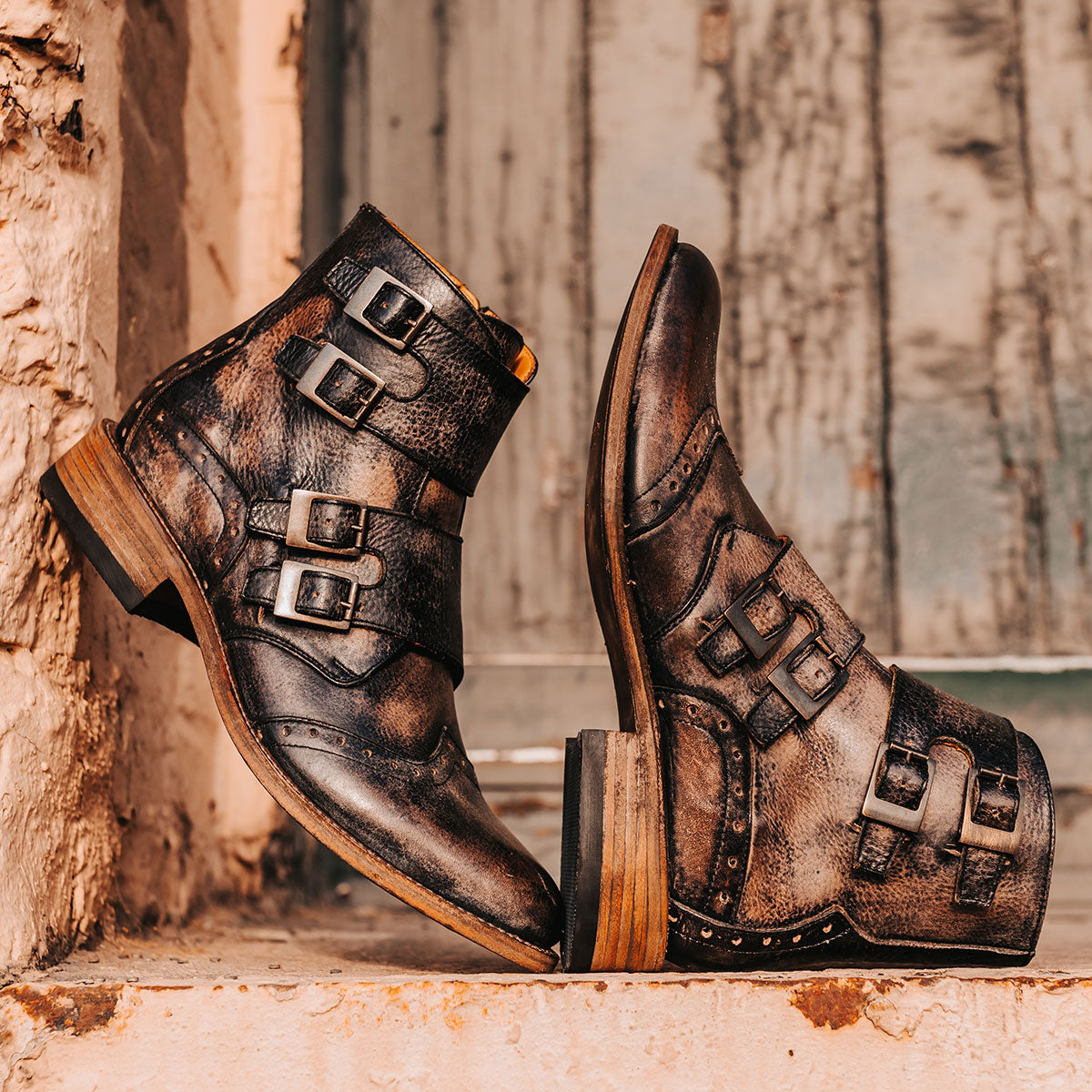 FREEBIRD men's Penn black dress boot with brogue detailing and decorative straps