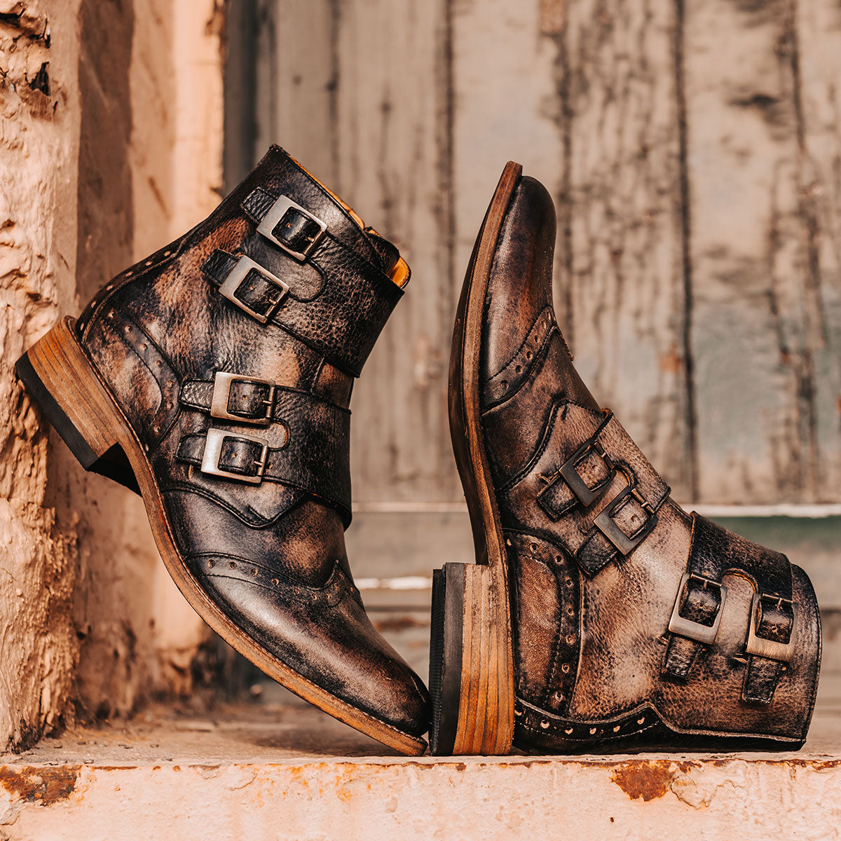 FREEBIRD men's Penn black dress boot with brogue detailing and decorative straps