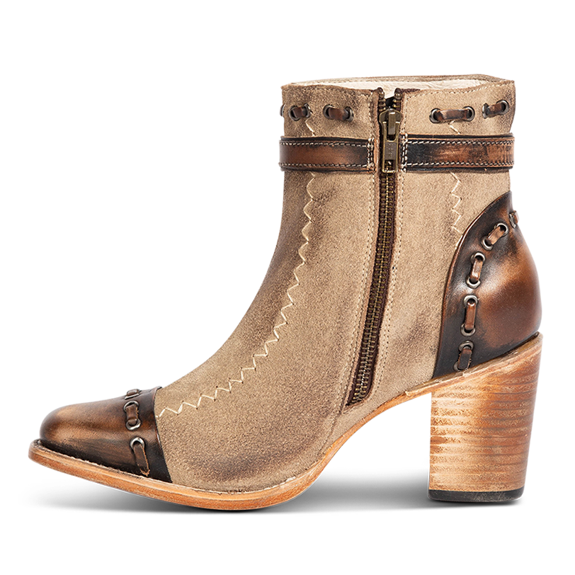 Inside view showing brass zip closure and leather whip stitch detailing on FREEBIRD women's Poppy beige suede bootie