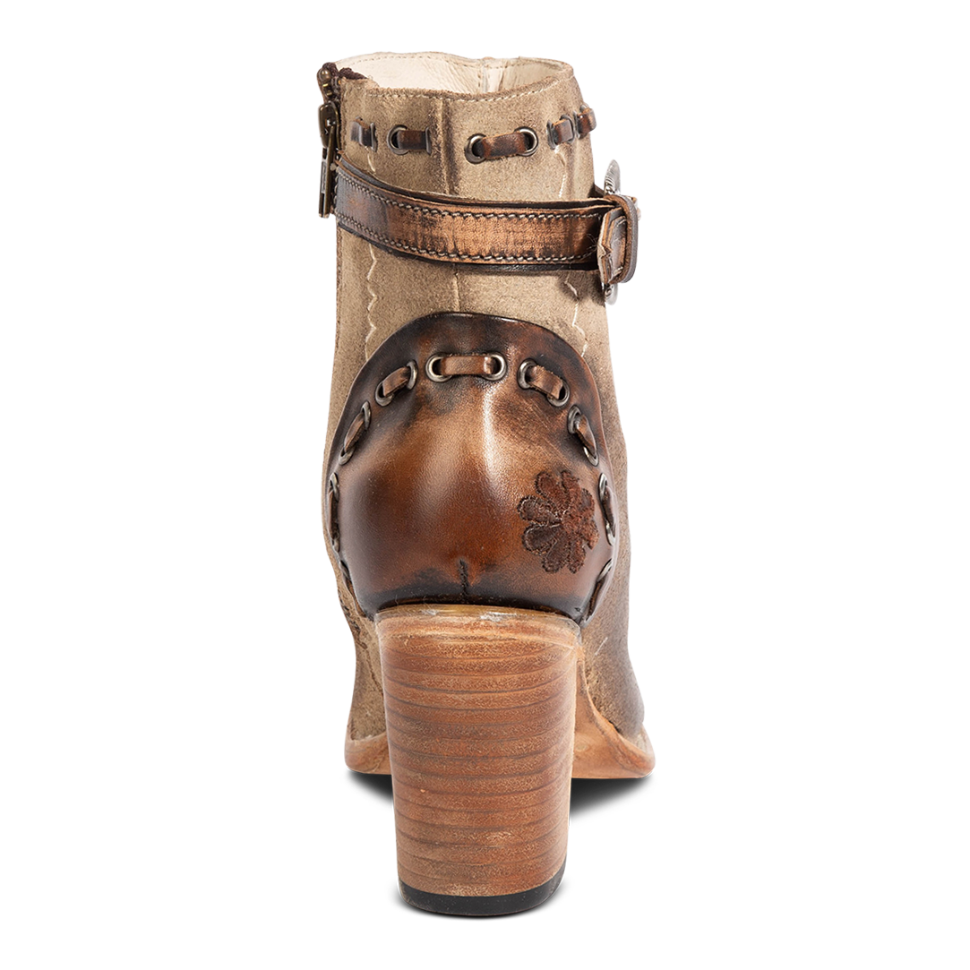 Back view showing leather heel construction and wrapped leather high heel on FREEBIRD women's Poppy beige suede bootie