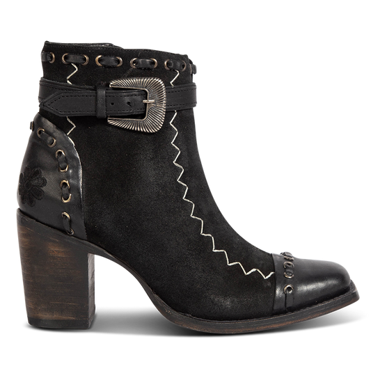 FREEBIRD women's Poppy black suede bootie with high heel, inside zip closure, decorative belt, and floral detailing 