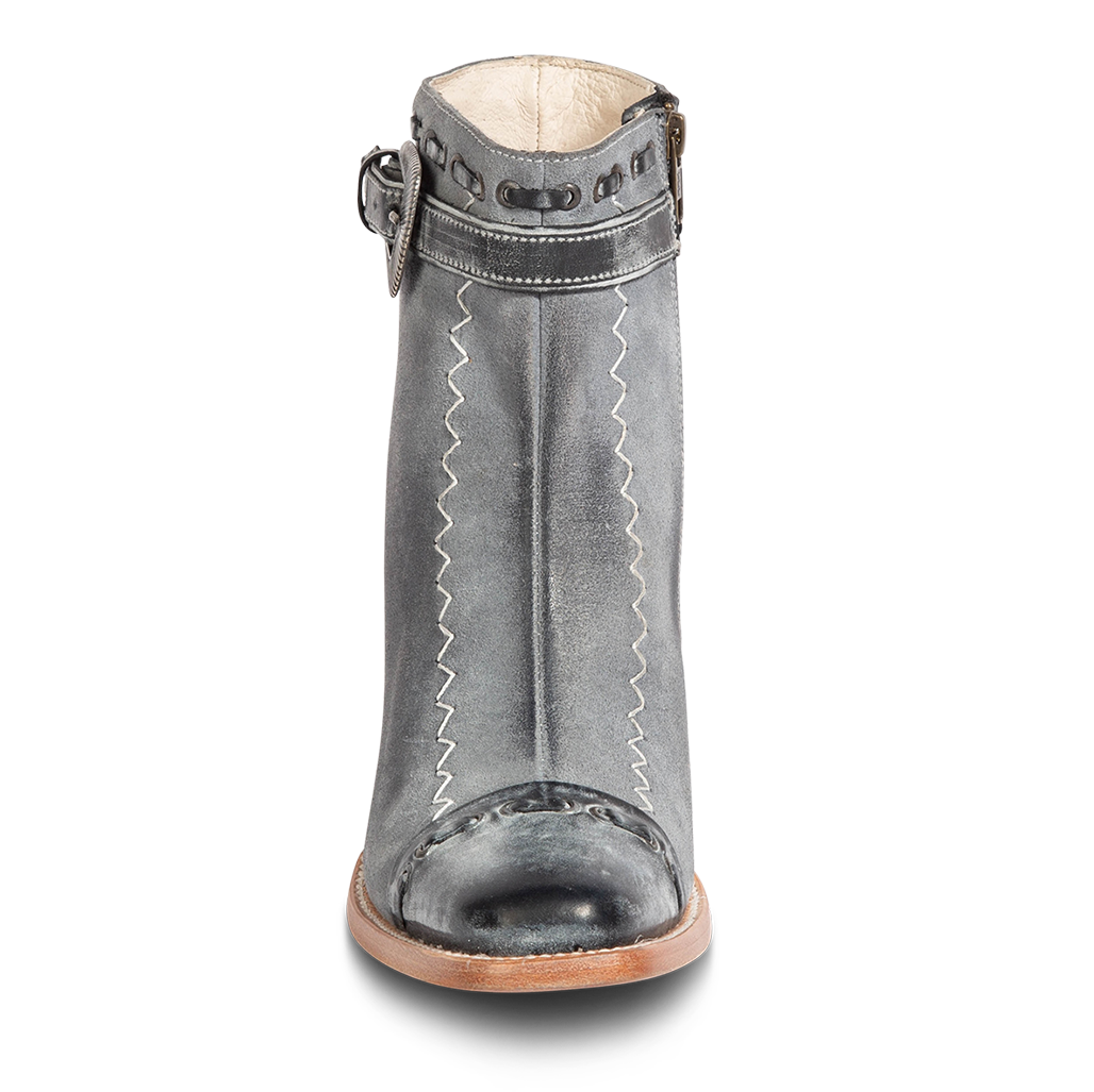 Front view showing solid leather toe cap and contrasting chevron shaft stitch detailing on FREEBIRD women's Poppy blue suede bootie