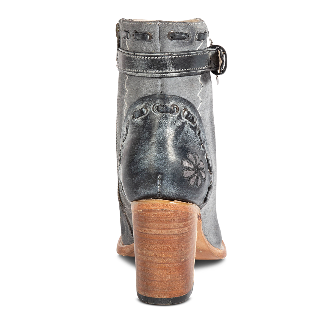 Back view showing leather heel construction and wrapped leather high heel on FREEBIRD women's Poppy blue suede bootie