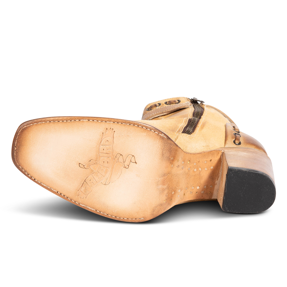 Leather sole imprinted with FREEBIRD on women's Poppy tan suede bootie