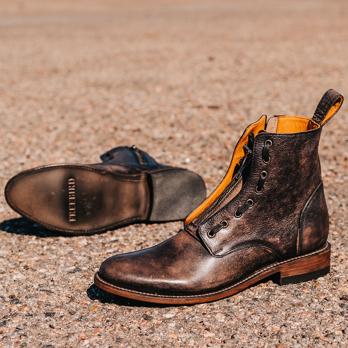 FREEBIRD men's Porter black leather boot featuring double zip closures, adjustable front lacing and an almond toe