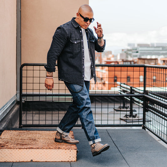 FREEBIRD men's Portland black leather boot featuring a leather ankle harness with brass chainlink detail, a working inside zip closure and low block heel lifestyle 