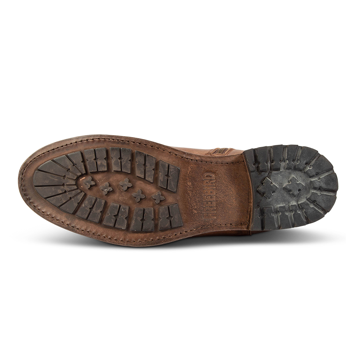 Rubber tread sole imprinted with FREEBIRD on men's Pueblo tan ankle boot