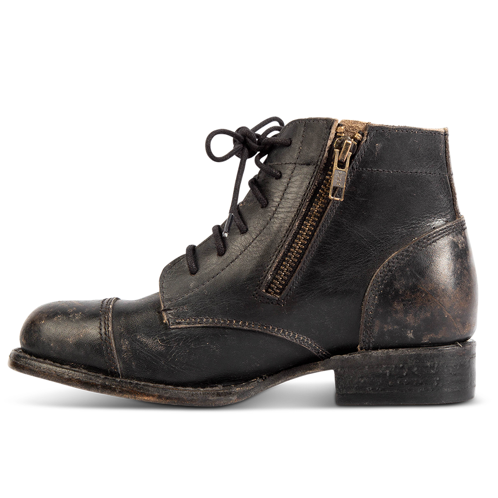 Inside view showing working brass zipper, low heel and round toe on FREEBIRD women's Rafter black leather bootie