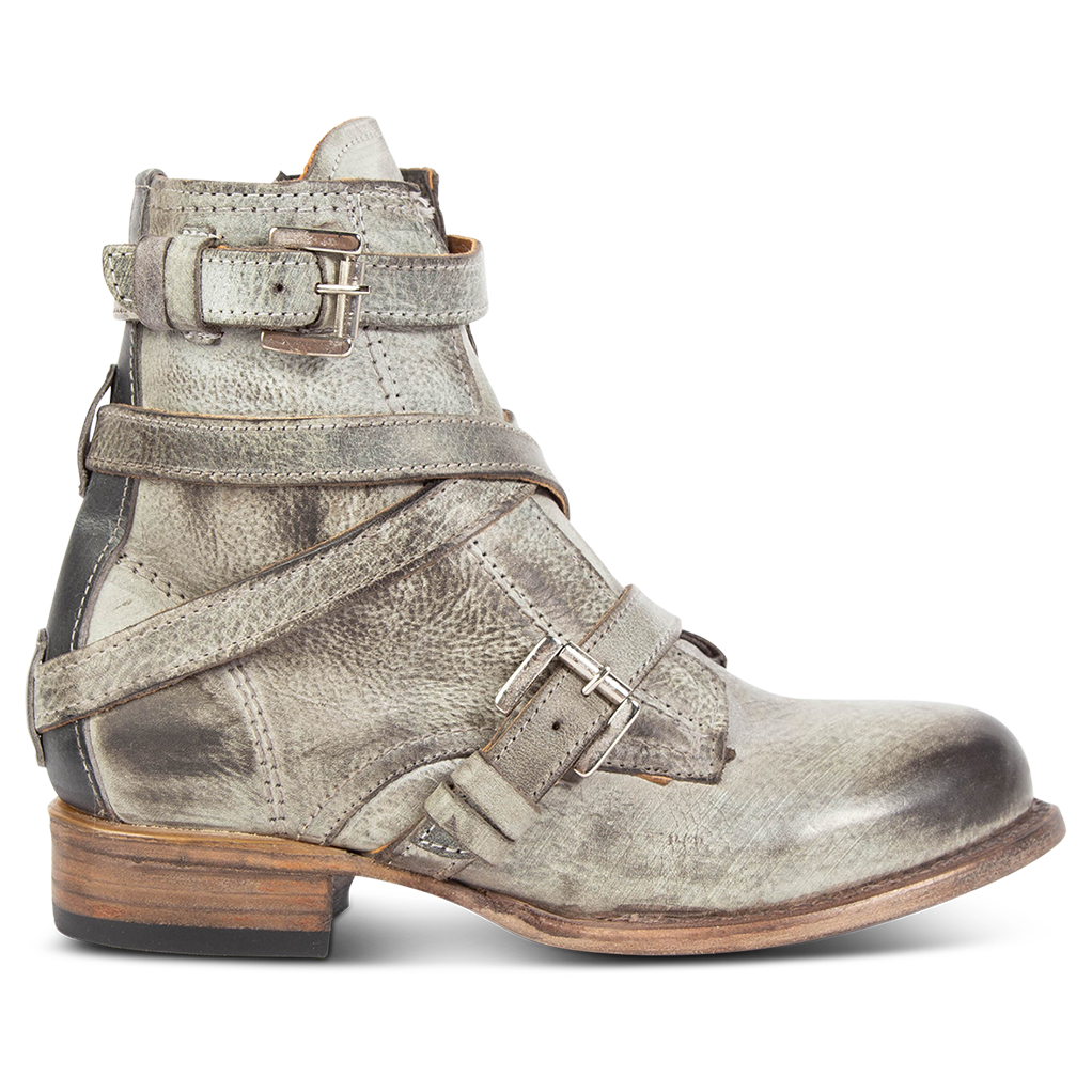 FREEBIRD women's Raine stone full grain leather bootie with inside zip closure, wooden heel, and leather overlays with metal buckles