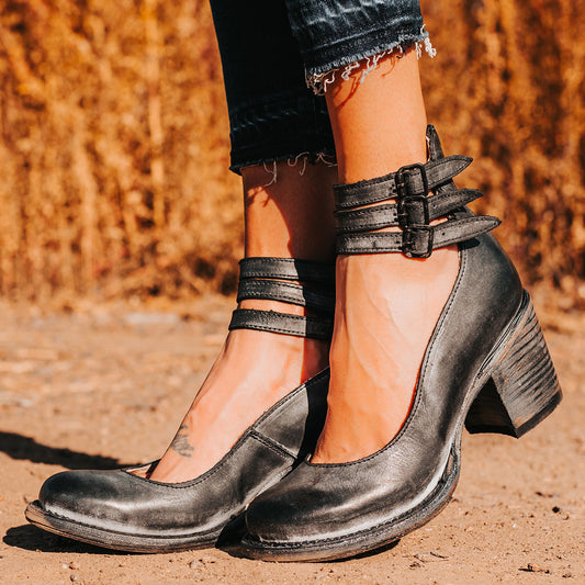 FREEBIRD women's Randi black leather open construction ankle strap heel with adjustable rustic buckles
