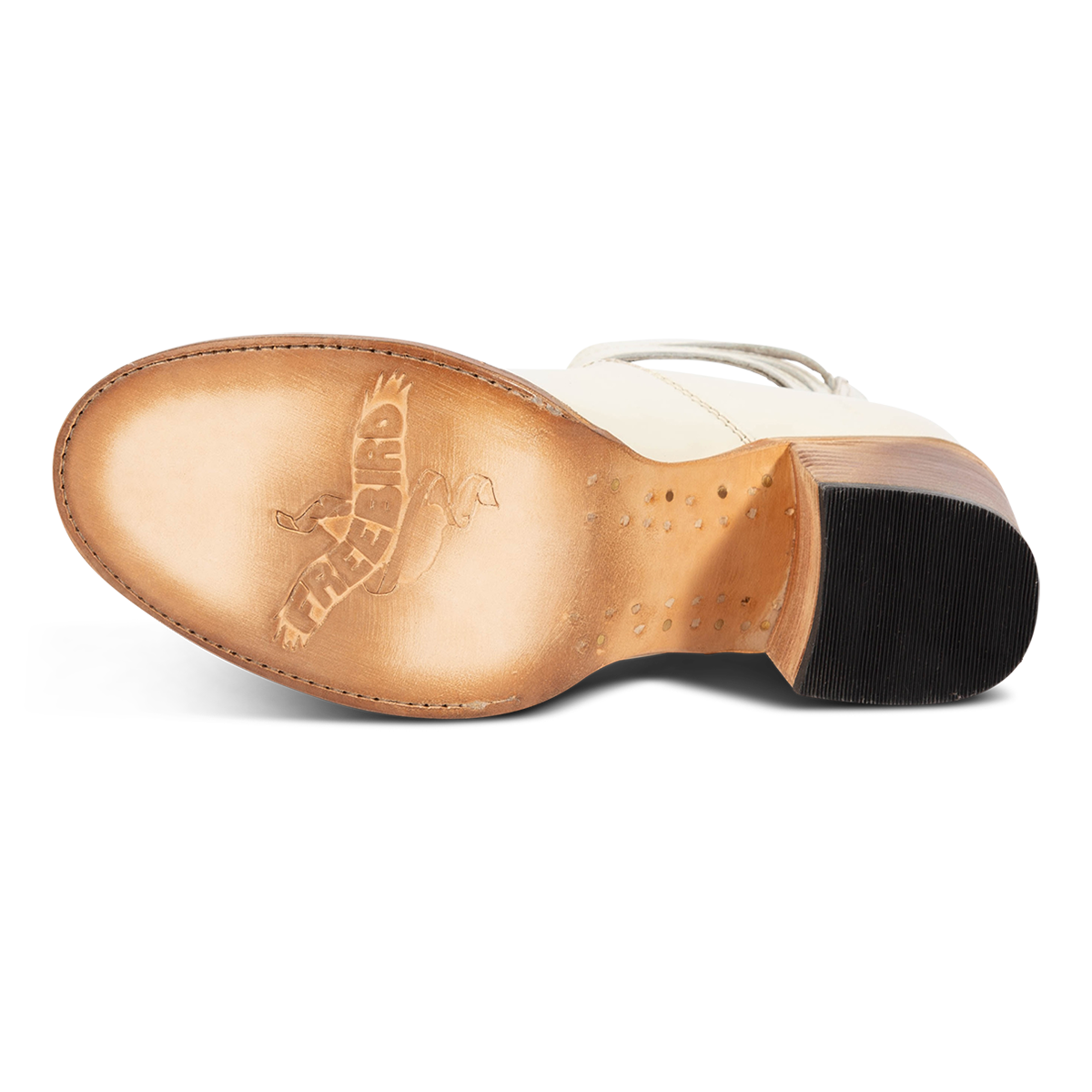 Leather sole imprinted with FREEBIRD on women's Randi cream patent leather heels