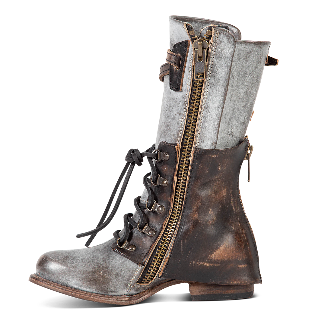 Inside view showing working brass zip closure and overlay leather construction on FREEBIRD women's Ravi ice mid calf leather boot