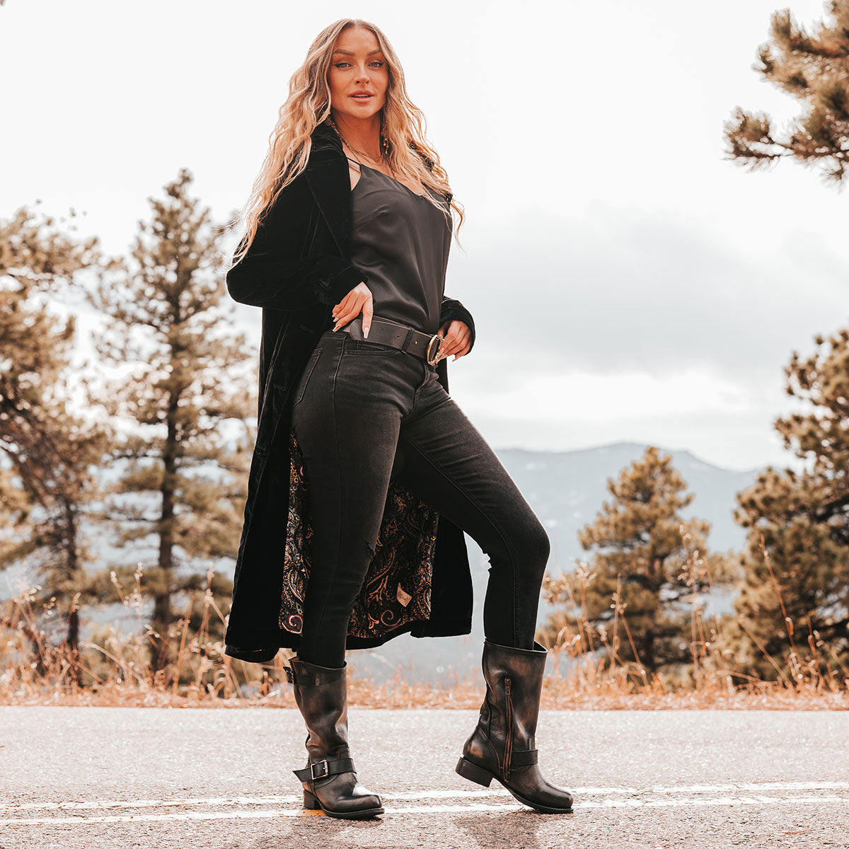 FREEBIRD women's Rip black leather boot with functioning buck straps, a working brass inside zipper and a low block heel lifestyle