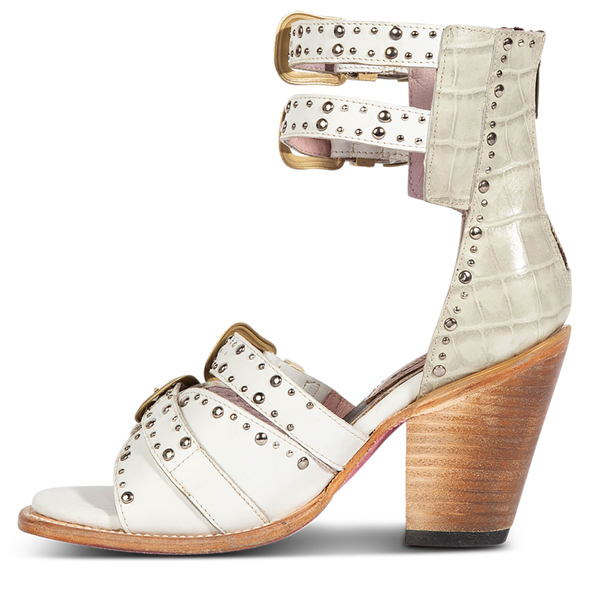 Inside view showing FREEBIRD women's Rodeo white multi leather sandal with silver stud embellishments, adjustable gold buckle detailing and a lifted inverted heel