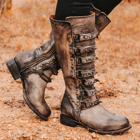 FREEBIRD women's Rory black leather boot with leather straps stacking up the front shaft and inside zip closure