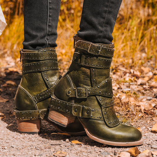 Freebird women's ROWDY green leather bootie with leather overlay details, stud embellishments and a mid sized heel