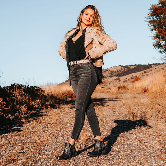 FREEBIRD women's Ryder black leather bootie with inside zip closures, eyelet whip stitch leather detailing and an almond toe lifestyle