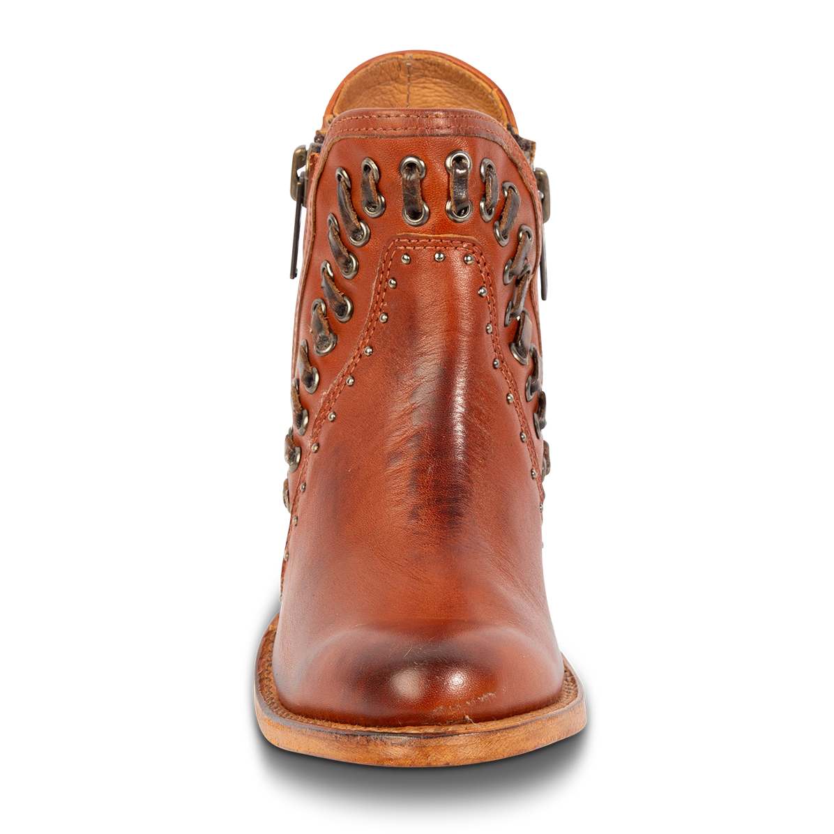 Front view showing FREEBIRD women's Ryder whiskey leather bootie with eyelet whip stitch leather detailing and an almond toe