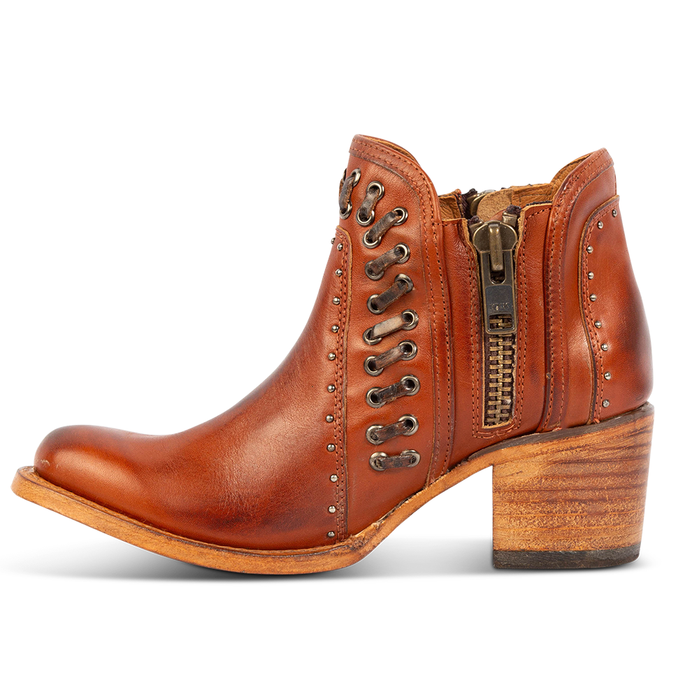 Inside view showing women's Ryder whiskey leather bootie with inside zip closures, eyelet whip stitch leather detailing and an almond toe