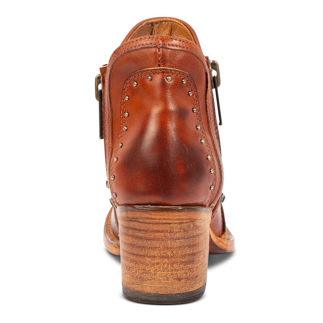 Back view showing studded detail and block heel on FREEBIRD women's whiskey leather Ryder bootie