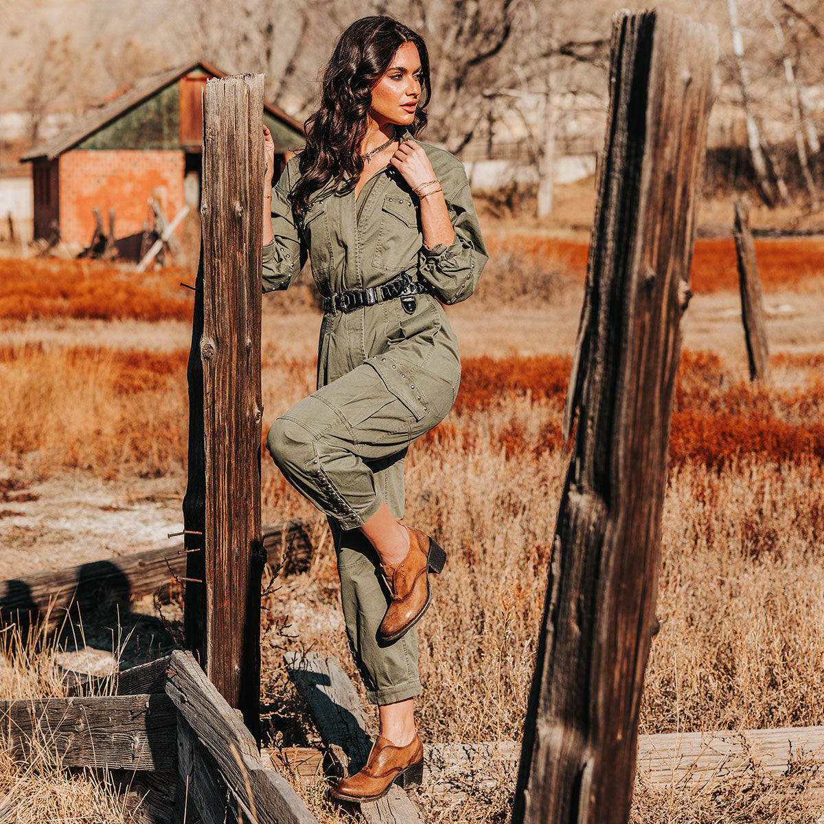 Featuring brogue detailing, silver hardware and distressed leather on FREEBIRD women's Sadie Brown leather Oxford shoe lifestyle