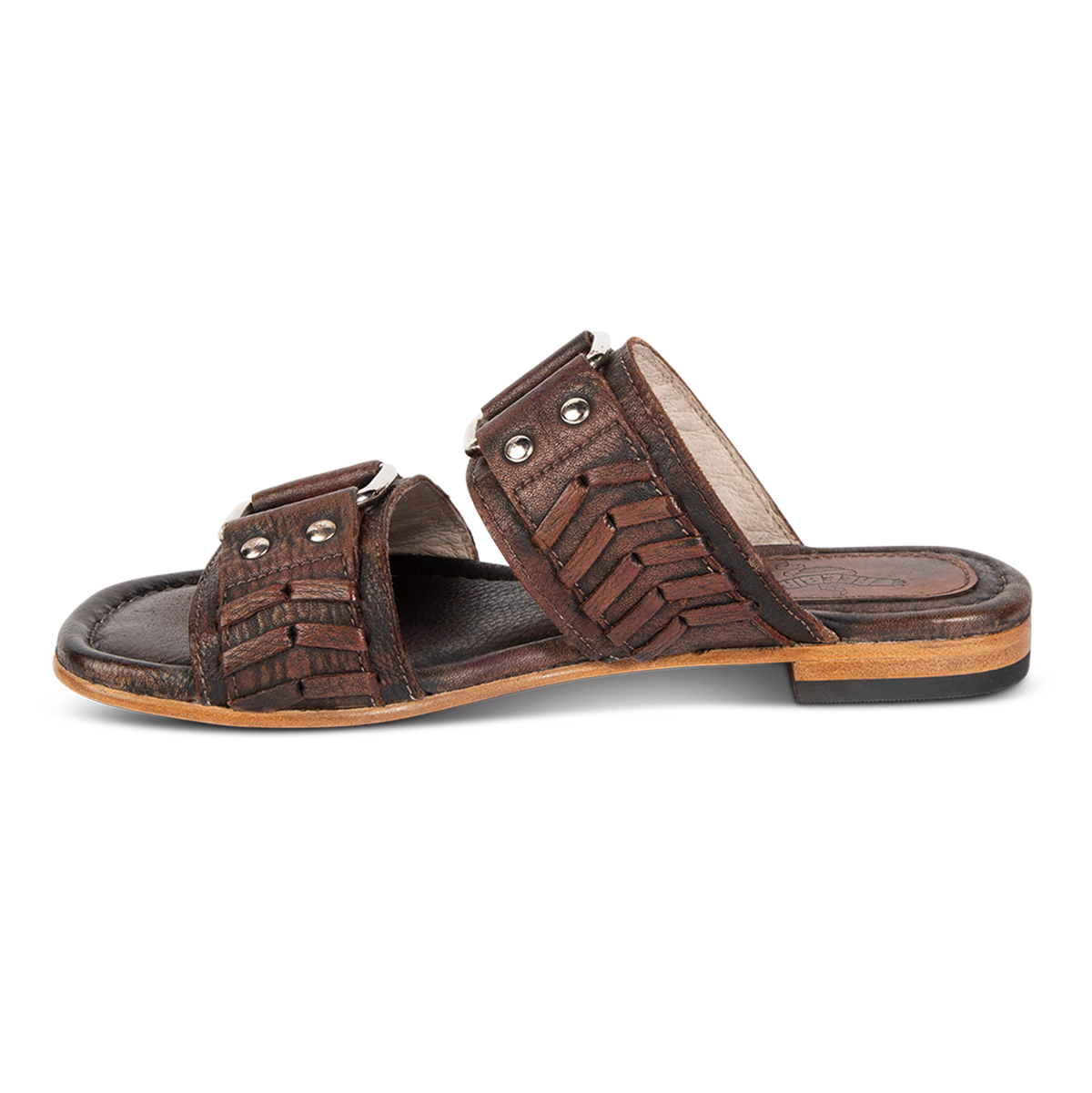 Inside view showing FREEBIRD woven leather detailed foot straps on women's Sage black low heeled slip-on sandal