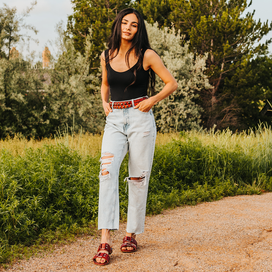 FREEBIRD women's Sage red low heeled slip-on sandal featuring double foot strap with metal accents lifestyle