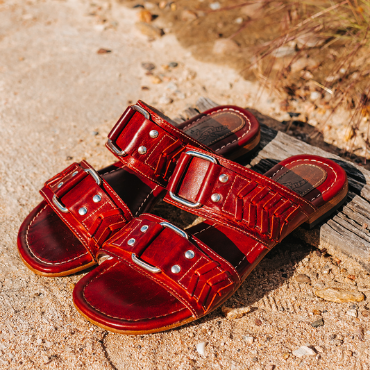 FREEBIRD women's Sage red low heeled slip-on sandal featuring double foot strap with metal accents