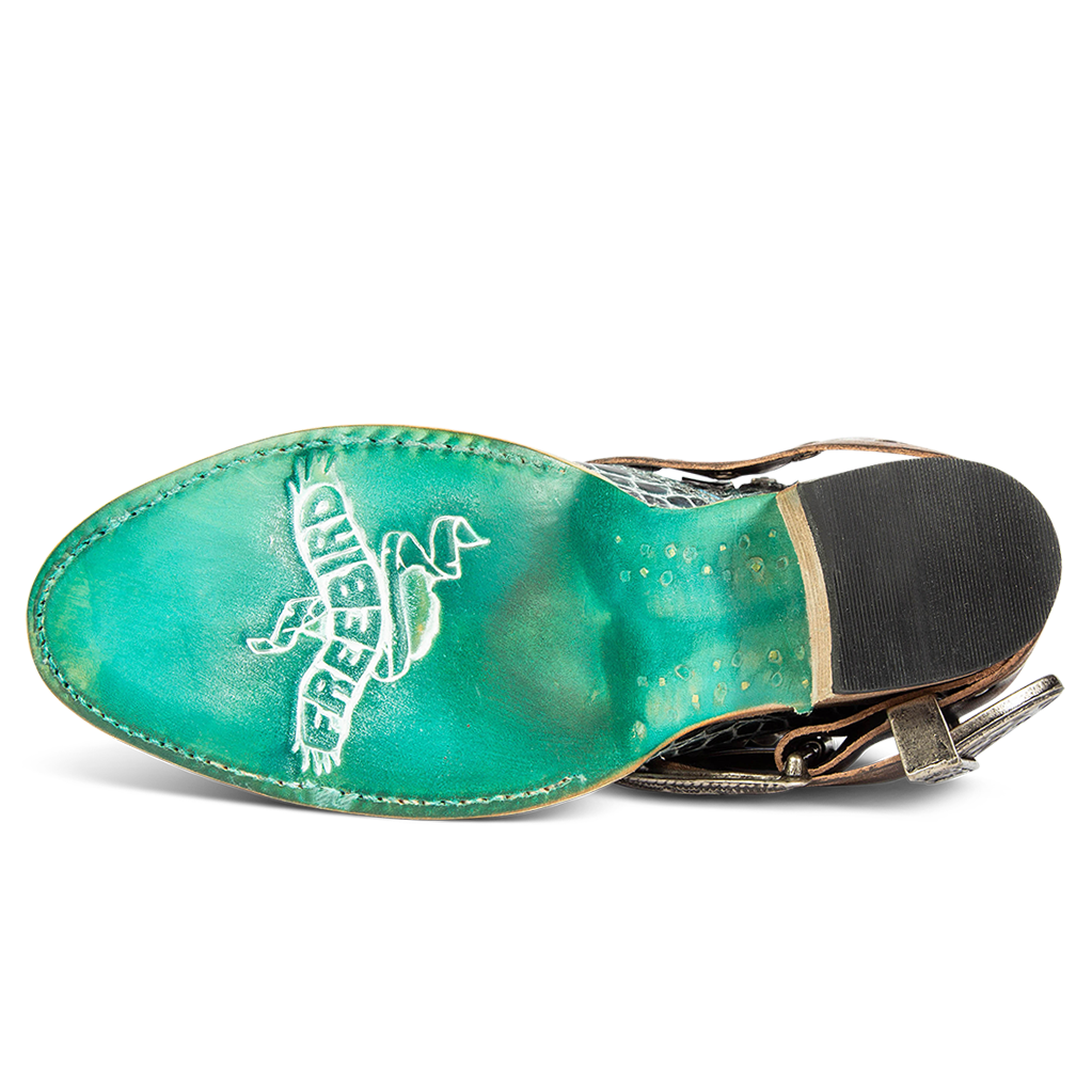 Turquoise leather sole imprinted with FREEBIRD on women's Saloon turquoise croco bootie